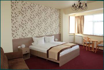Фото номера Улучшенный двухместный номер с 1 кроватью Гостевой дом Pensiunea Rix Rooms г. Фокшани 5