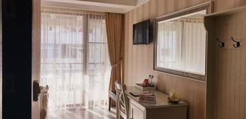 Фото номера Двухместный номер с 1 кроватью и балконом Отель Romantic Boutique Hotel г. Фокшани 7