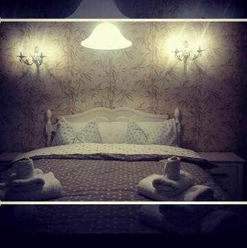 Фото номера Семейный номер с балконом Отель Romantic Boutique Hotel г. Фокшани 4
