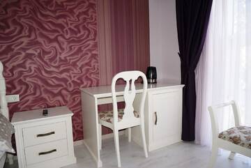 Фото номера Двухместный номер Делюкс с 1 кроватью Отель Romantic Boutique Hotel г. Фокшани 10