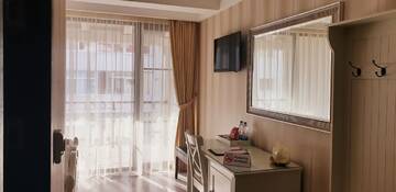 Фото номера Двухместный номер с 1 кроватью и балконом Отель Romantic Boutique Hotel г. Фокшани 3