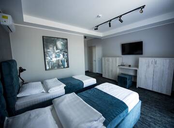 Фото номера Двухместный номер с 2 отдельными кроватями Отель ZEN Hotel Focșani г. Фокшани 6