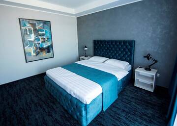 Фото номера Апартаменты с 1 спальней Отель ZEN Hotel Focșani г. Фокшани 10