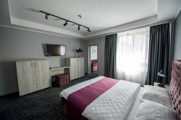 Фото номера Апартаменты с 1 спальней Отель ZEN Hotel Focșani г. Фокшани 4